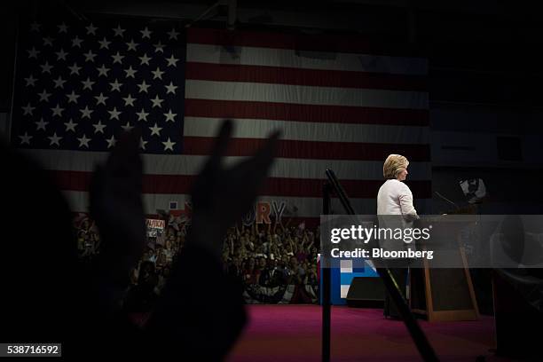 Hillary Clinton, former Secretary of State and presumptive Democratic presidential nominee, speaks at the podium during a primary night event at the...