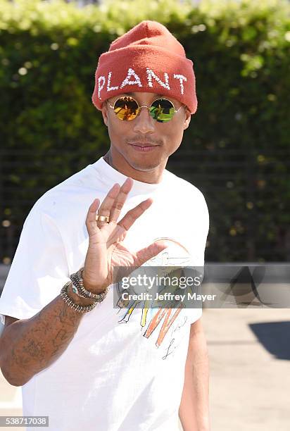 Singer/musician Pharrell Williams arrives at 'The Voice' Karaoke For Charity event at HYDE Sunset: Kitchen + Cocktails on April 21, 2016 in West...