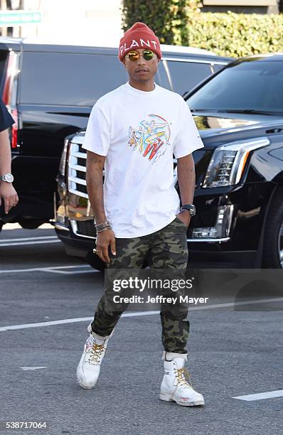 Singer/musician Pharrell Williams arrives at 'The Voice' Karaoke For Charity event at HYDE Sunset: Kitchen + Cocktails on April 21, 2016 in West...