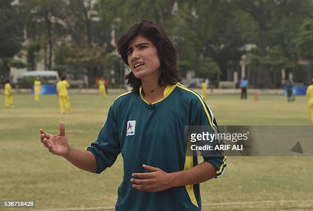 In this photograph taken on May 3 Pakistani national cricket and football player Diana Baig gestures as she speaks with AFP during an interview in...