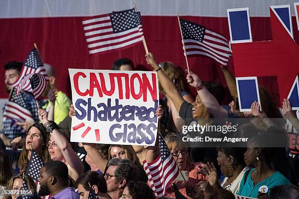 Supporters cheer before the arrival of Democratic presidential candidate Hillary Clinton during a primary night rally at the Duggal Greenhouse in the...