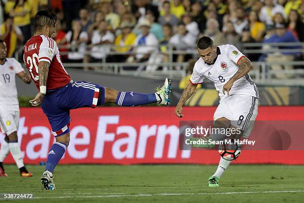 Edwin Cardona of Colombia shoots past Victor Ayala of Paraguay during the second half of a 2016 Copa America Centenario Group A match between...