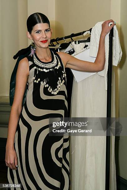 Model poses backstage ahead of the FW Trends Runway as part of the Mercedes Benz Fashion Festival Sydney 2012 at Sydney Town Hall on August 21, 2012...