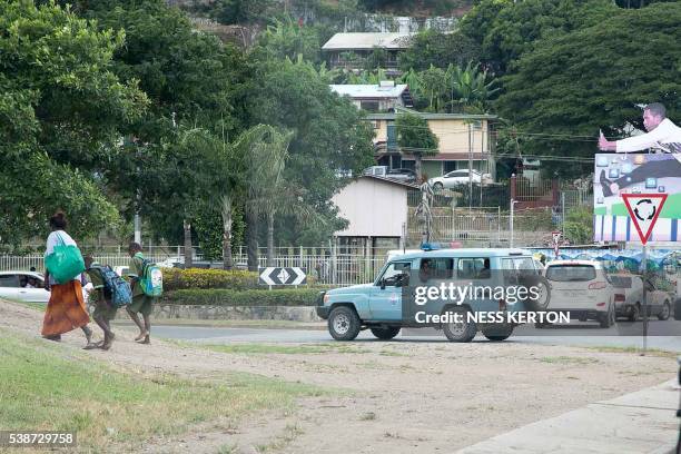 Police patrols the area around the University of Papua New Guinea following a protest rally by the students in Port Moresby on June 8, 2016. - Police...