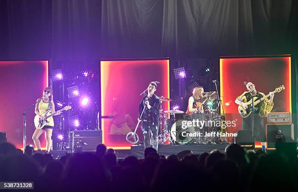 Guitarist JinJoo Lee, singer Joe Jonas, drummer Jack Lawless and bassist Cole Whittle of DNCE perform at Time Warner Cable Arena on June 7, 2016 in...