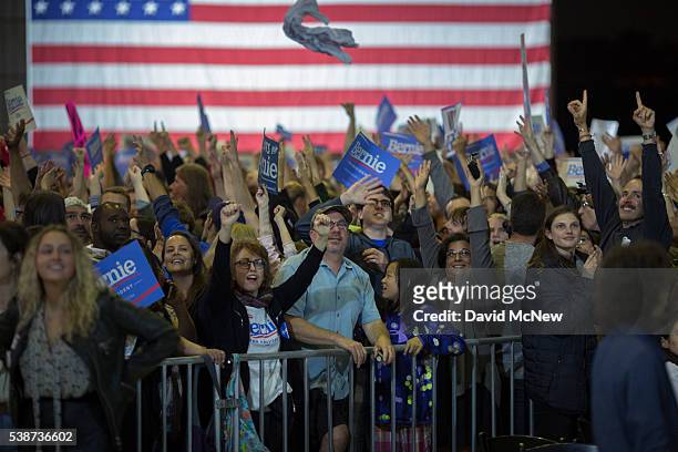 Supporters react to a televised election report at the California primary election night rally for Democratic presidential candidate Senator Bernie...