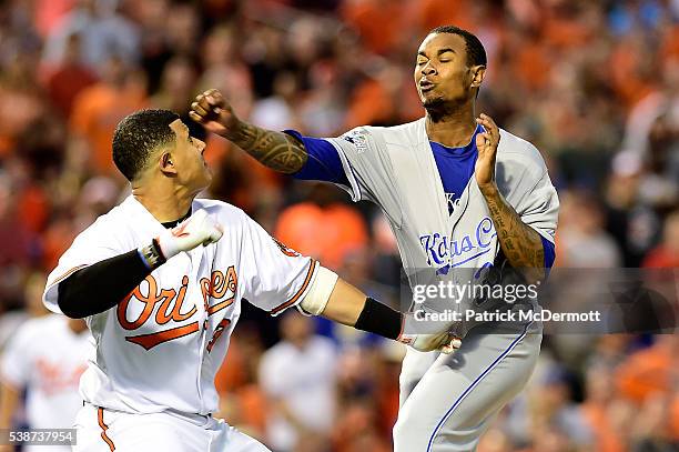 Manny Machado of the Baltimore Orioles and Yordano Ventura of the Kansas City Royals fight in the fifth inning during a MLB baseball game at Oriole...