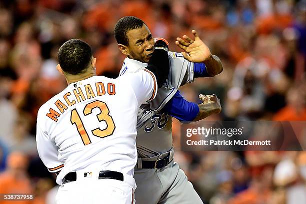 Manny Machado of the Baltimore Orioles and Yordano Ventura of the Kansas City Royals fight in the fifth inning during a MLB baseball game at Oriole...