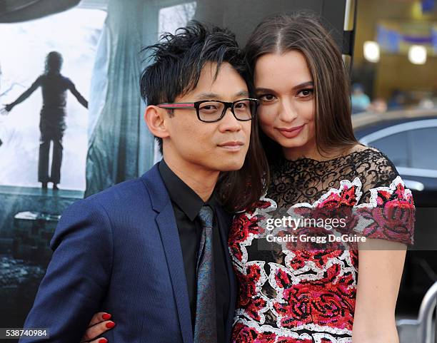 Director James Wan and actress Ingrid Bisu arrive at the 2016 Los Angeles Film Festival - "The Conjuring 2" Premiere at TCL Chinese Theatre IMAX on...