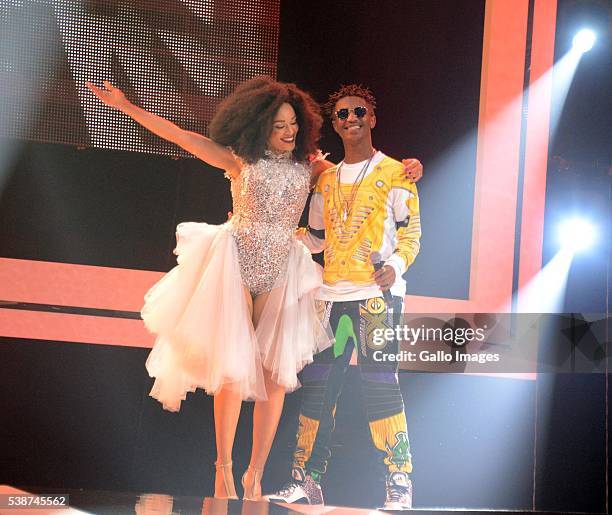 Emtee and Pearl Thusi on stage during the 22nd annual South African Music Awards at the Durban International Convention Centre on June 04, 2016 in...