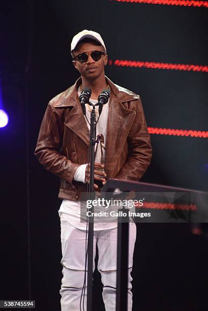 Emtee receives his award during the 22nd annual South African Music Awards at the Durban International Convention Centre on June 04, 2016 in Durban,...