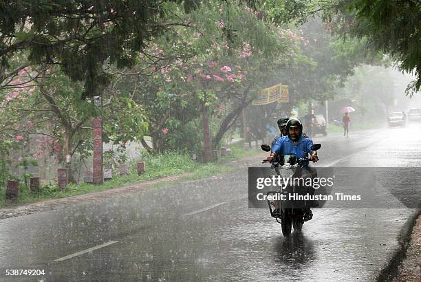 Traffic moving in heavy showers as the first winds of southwest monsoon hits Kerala on June 7, 2016 in Thiruvananthapuram, India. The news arrival of...