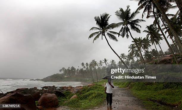 Dark clouds hover over sea coast as the first winds of southwest monsoon hits Kerala on June 7, 2016 in Thiruvananthapuram, India. The news arrival...