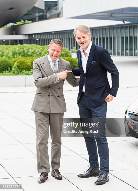 Designer Lapo Elkann and BMW Group Chief Designer Adrian van Hooydonk pose during the presentation of the BMW i8 Futurism Edition on June 8, 2016 in...