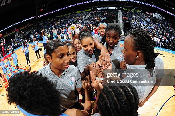 The Atlanta Dream huddle up prior to the start of the WNBA game against the Chicago Sky on May 22, 2016 at Philips Arena in Atlanta, Georgia. NOTE TO...