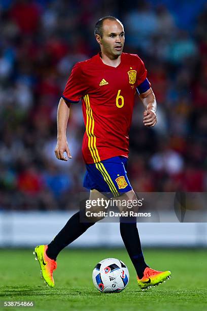Andres Iniesta of Spain runs with the ball during an international friendly match between Spain and Georgia at Alfonso Perez stadium on June 7, 2016...