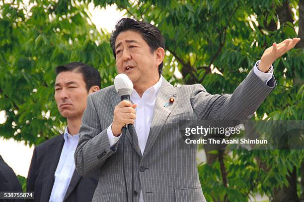 Japanese Prime Minister and ruling Liberal Democratic Party President Shinzo Abe makes a support speech for a candidate on June 8, 2016 in Kofu,...