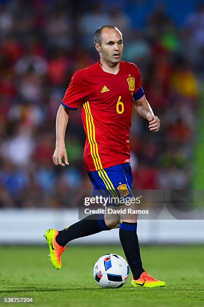 Andres Iniesta of Spain runs with the ball during an international friendly match between Spain and Georgia at Alfonso Perez stadium on June 7, 2016...