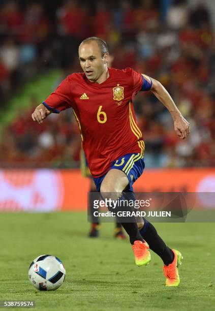 Spain's midfielder Andres Iniesta controls a ball during the friendly football match Spain vs Georgia at the Coliseum Alfonso Perez stadium in...