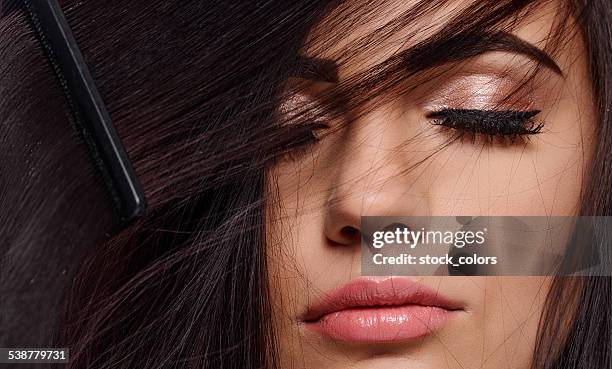 combing hair - combing stock pictures, royalty-free photos & images