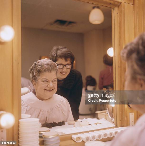 English actress Violet Carson who plays the character of Ena Sharples in the television soap opera Coronation Street, sits in makeup at Granada...