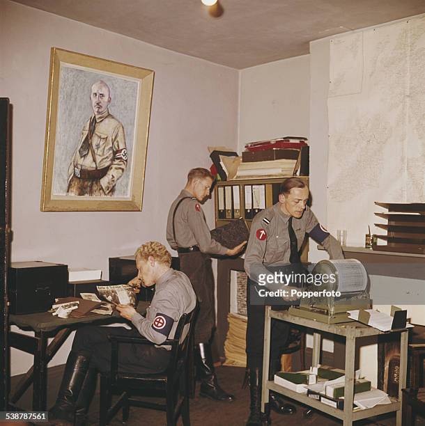 View inside the headquarters of the National Socialist Movement, a far right neo-nazi group, in London with one member of the group printing leaflets...