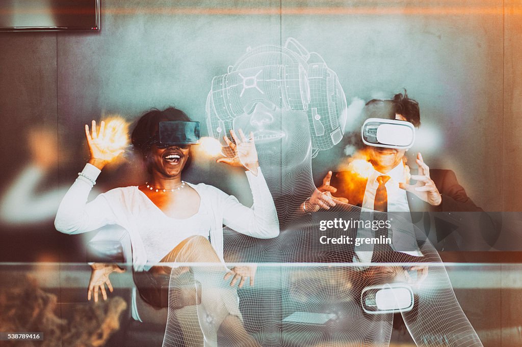 Business team using virtual reality headset in the office