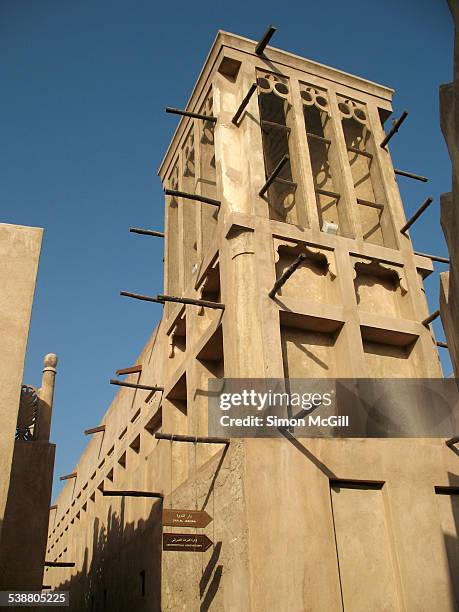 Wind tower used to cool a traditional building in Al Bastakiya historic district of Bur Dubai, Dubai, United Arab Emirates