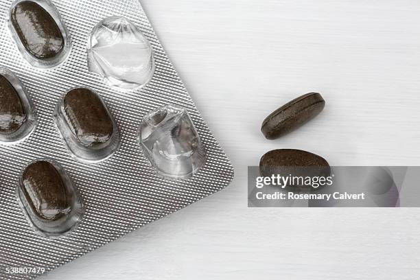 herbal supplements - valerian root stock pictures, royalty-free photos & images