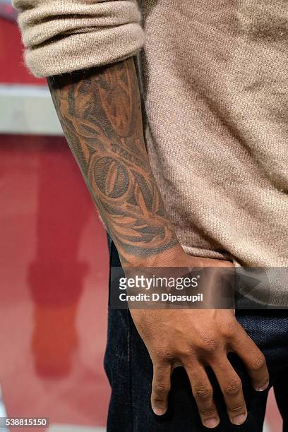Nick Cannon, tattoo detail, visits "Extra" at their New York studios at H&M in Times Square on June 8, 2016 in New York City.