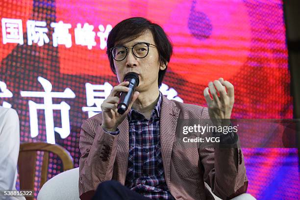 Chinese painter and art critic Lin Mingjie attends Urban Image of the Times - International Summit Forum of the "One-Minute Film" Competition during...