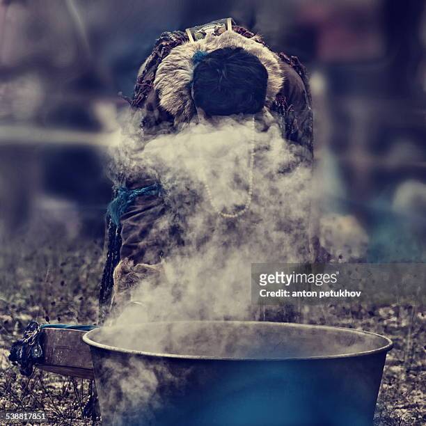 shaman on a fire - shamin stock-fotos und bilder