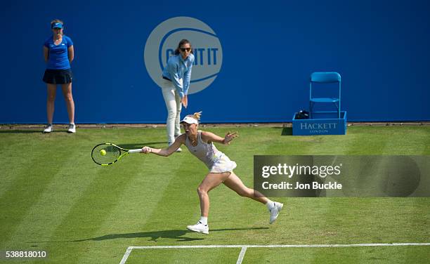 Caroline Wozniacki of Denmark stretches for the ball during her women's singles match against Anett Kontaveit of Estoniaon day three of the WTA Aegon...