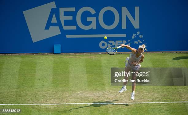 Caroline Wozniacki of Denmark serves the ball during her women's singles match against Anett Kontaveit of Estoniaon day three of the WTA Aegon Open...