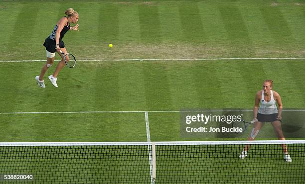 Jocelyn Rae and Anna Smith of Great Britain in action during their women's doubles match against Alla Kudryavtseva of Russia and Lin Zhu of China on...