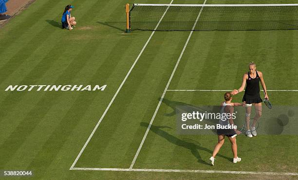 Jocelyn Rae and Anna Smith of Great Britain in action during their women's doubles match against Alla Kudryavtseva of Russia and Lin Zhu of China on...