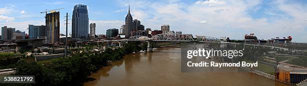 Panoramic view of Nashville skyline, Shelby Street Bridge and Nissan Stadium, home of the Tennessee Titans football team as photographed from the...