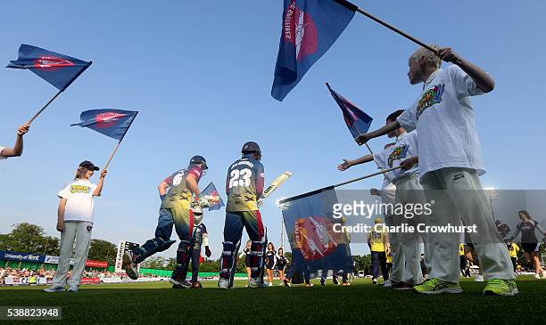 Joe Denly and Daniel Bell-Drummond of Kent make their way out onto the pitch during the NatWest T20 Blast match between Kent and Hampshire at The...
