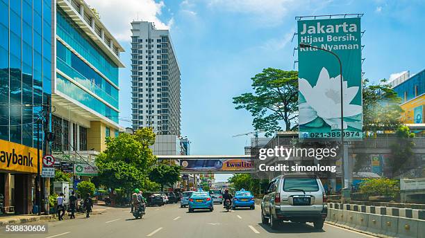 view from inside a taxi in jalan sudirman, jakarta,indonesia - sudirman stock pictures, royalty-free photos & images