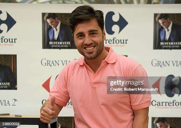 David Bustamante poses during a autograph session while promoting his latest music album release 'Amor de Los Dos' on June 8, 2016 in Barcelona,...