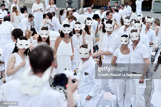 Guests attend The 28th 'Diner En Blanc' - Dinner In White In Paris on June 8, 2016 in Paris, France.