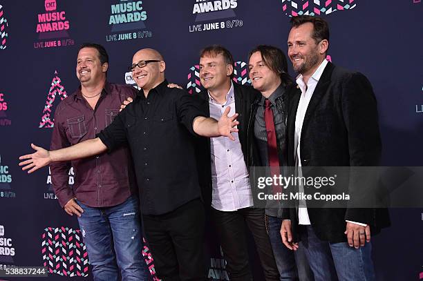 Ken Block, Andrew Copeland, Ryan Newell, Jeff Beres and Mark Trojanowski from the muscial group Sister Hazel attends the 2016 CMT Music awards at the...