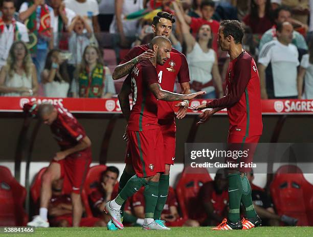 Portugal's forward Ricardo Quaresma celebrates with teammates after scoring a goal during the International Friendly match between Portugal and...