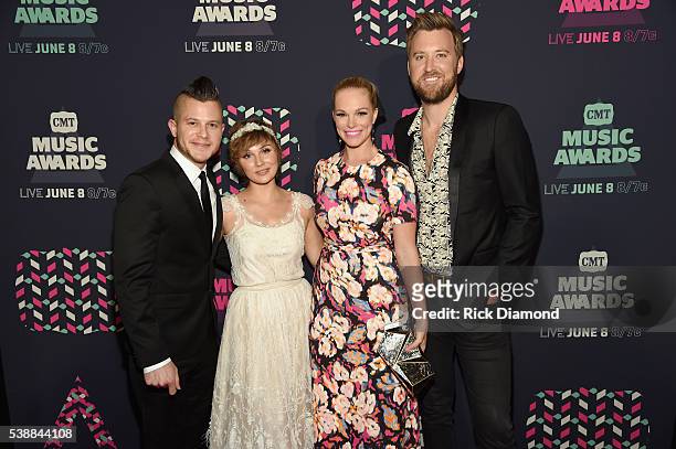 Brandon Robert Young, actress Clare Bowen, Cassie McConnell Kelley, and Charles Kelley of Lady Antebellum attend the 2016 CMT Music awards at the...