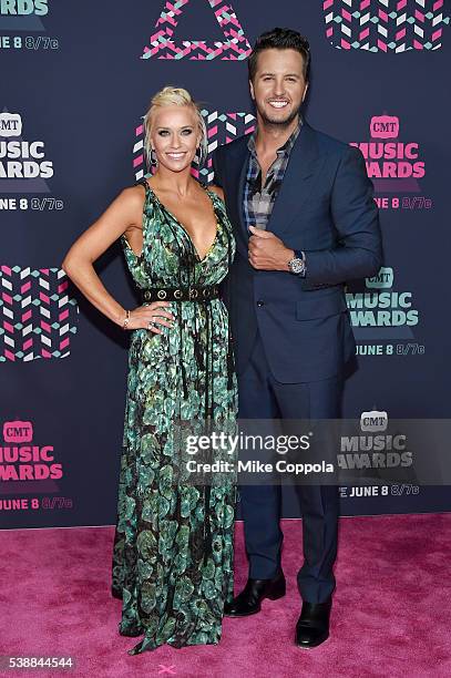 Caroline Boyer and singer-songwriter Luke Bryan attends the 2016 CMT Music awards at the Bridgestone Arena on June 8, 2016 in Nashville, Tennessee.