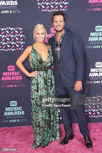 Caroline Boyer and Luke Bryan attend the 2016 CMT Music awards at the Bridgestone Arena on June 8, 2016 in Nashville, Tennessee.