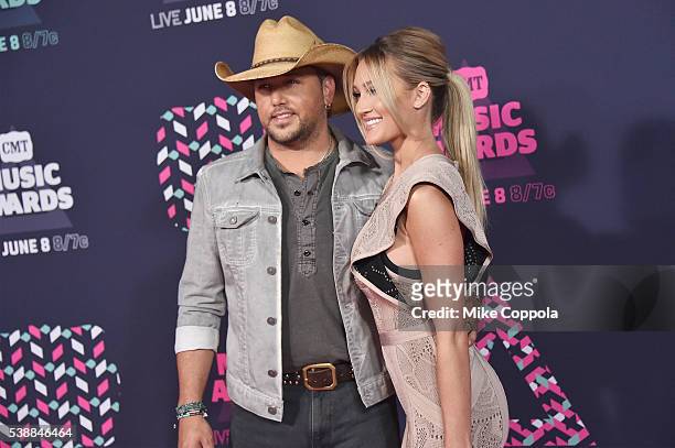 Singer Jason Aldean and Brittany Kerr attends the 2016 CMT Music awards at the Bridgestone Arena on June 8, 2016 in Nashville, Tennessee.