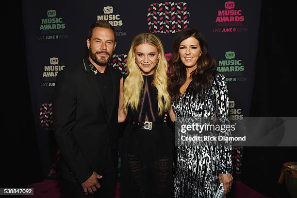 Jimi Westbrook and Karen Fairchild of Little Big Town pose with Kelsea Ballerini during the 2016 CMT Music awards at the Bridgestone Arena on June 8,...