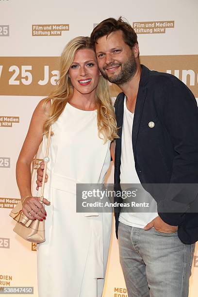 Nele Kiper and Peter Thorwarth attend the Film- und Medienstiftung NRW summer party on June 8, 2016 in Cologne, Germany.