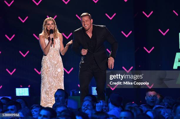 Host Erin Andrews and Co-Host JJ Watt onstage during the 2016 CMT Music awards at the Bridgestone Arena on June 8, 2016 in Nashville, Tennessee.